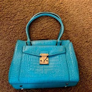 Antonio Melani never used turquoise croc textured purse.